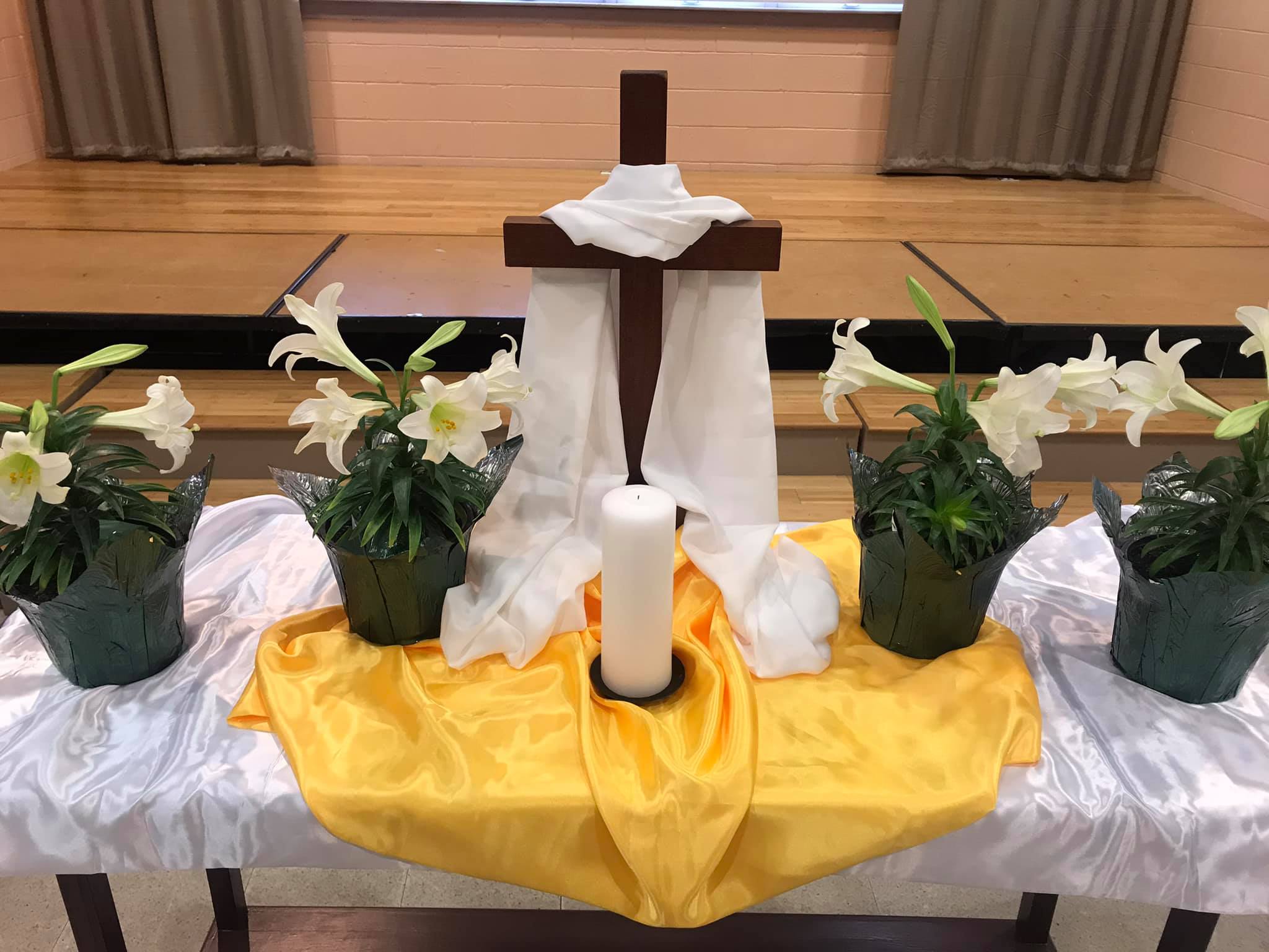 Easter photo cross and easter lillies at contmp. service